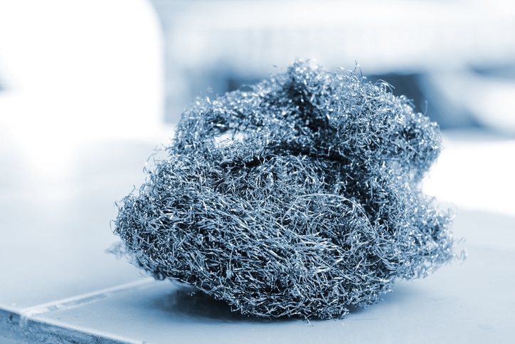 A giant ball of steel wool sitting on a counter