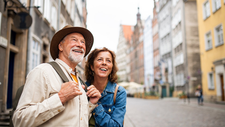 a middle aged couple enjoying sightseeing